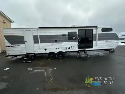 Forest River Wildwood travel trailer 36VBDS highlights: Rear Private Bedroom Walk-Through Bath Firep...