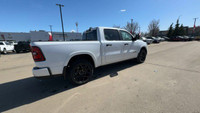This 2025 RAM 1500 LARAMIE CREW CAB 4X4 has the following options Leather Trimmed Bucket Seats, Remo... (image 1)