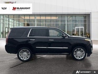 The 2019 Cadillac Escalade includes four-wheel drive, an adaptive air suspension, and power retracta... (image 5)