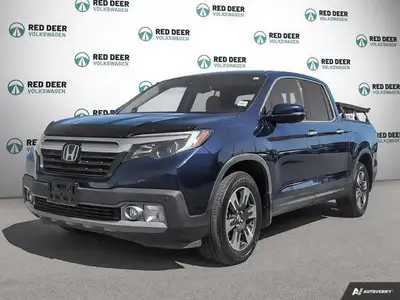 Experience the exceptional blend of power and comfort with the 2019 Honda Ridgeline Touring AWD in a...