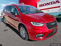 Command attention with this 2024 Chrysler Pacifica Touring-L, boasting a stunning Red Hot Pearl Coat... (image 7)