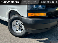 The 2025 Chevrolet Express Cargo Van 2500 Extended Wheelbase Rear-Wheel Drive in classic white is bu... (image 1)