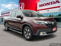 This 2019 Honda Ridgeline Touring Crew Cab Pickup boasts a powerful engine and a luxurious interior,... (image 7)