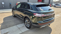 The 2021 Lincoln Nautilus Reserve is a mid-size luxury SUV that offers a blend of refined design, ad... (image 2)