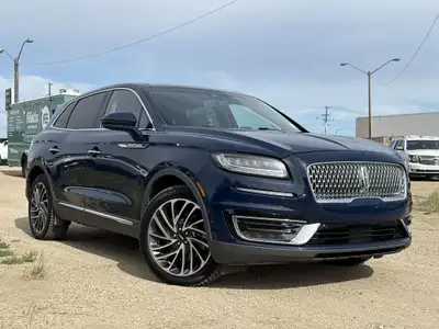 Under the glistening Rhapsody Blue exterior, the 2019 Lincoln Nautilus Reserve stands as a testament...
