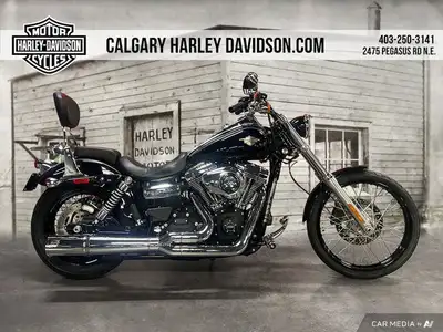 This 2013 Dyna Wide Glide comes equipped with a Newly Built 110in. Engine, 2-into-1 Vance & Hines Ex...