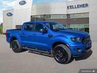 This 2021 Ford Ranger 4x4 Crew Cab, Velocity Blue with a sleek black interior, is ready for adventur... (image 6)