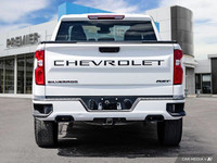 Command the road in this powerful 2024 Chevrolet Silverado 1500 RST! This head-turning Summit White... (image 4)
