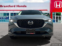 Experience the confident handling and smooth ride of this 2024 Mazda CX-5 GS, boasting only 6904 kil... (image 8)