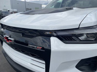 The 2025 Chevrolet Colorado ZR2, presented in Summit White with a Jet Black/Artemis interior, is eng... (image 2)