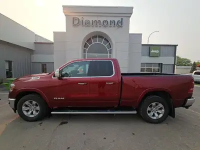 The Power of Capability, Refined with LuxuryThis 2020 Ram 1500 Laramie 4x4 Quad Cab combines rugged...
