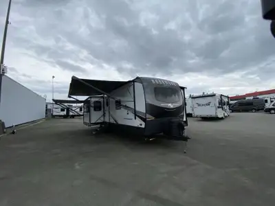 Forest River Rockwood Signature travel trailer 8337RL highlights: Triple Slide Outs Two Power Awning...