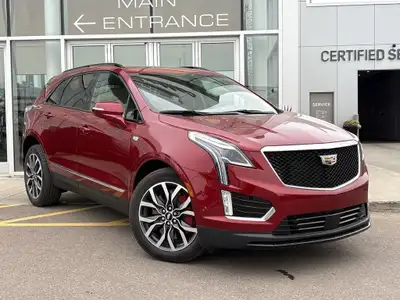 Stand out in Radiant Red Tintcoat with this premium 2023 Cadillac XT5 Sport AWD, blending luxury, pe...