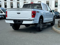 This 2023 Ford F-150 XLT has an Oxford White Exterior and Black Interior with seating for 5. Equippe... (image 7)