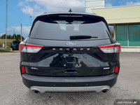 This Ford Escape boasts a Intercooled Turbo Premium Unleaded I-3 1.5 L/91 engine powering this Autom... (image 5)