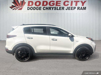 This Kia Sportage delivers a Intercooled Turbo Regular Unleaded I-4 2.0 L/122 engine powering this A... (image 6)
