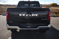 This Ram 1500 has a dependable Gas/Electric V-6 3.6 L/220 engine powering this Automatic transmissio... (image 2)