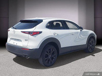 Le Mazda CX-30 GT 2024 se positionne comme un VUS sous-compact raffiné, offrant un équilibre entre d... (image 6)