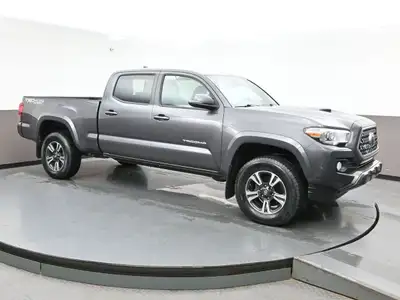 The 2019 Toyota Tacoma with a 3.5L V6 is a rugged midsize truck built for performance and reliabilit...