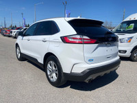 The 2019 Ford Edge SEL with a 2.0L EcoBoost engine is a charismatic midsize SUV that fuses bold desi... (image 2)