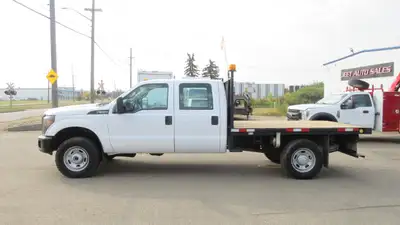 2015 Ford F-350 Flatbed Truck 4X4 Low Km's AMVIC LICENSED..... Ask for Special Financing & Leasing d...