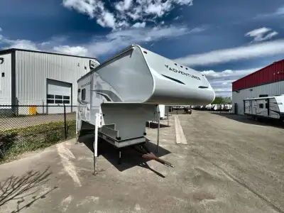 Adventurer Manufacturing Inc. Adventurer 910DB truck camper highlights: Booth Dinette King Bed Bath...