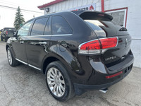 This 2013 Lincoln MKX AWD delivers a premium driving experience with a powerful V6 engine, a well-ap... (image 5)