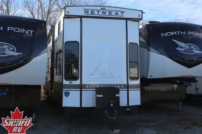 Introducing the 2024 Retreat 39CLDL, make by Keystone. This destination trailer is designed for exte...