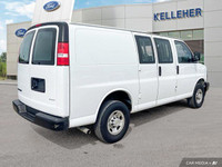 Need a reliable workhorse for your business? This 2023 Chevrolet Express Cargo Van, boasting a low 9... (image 4)
