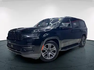 The 2022 Jeep Wagoneer Series III 4x4 in elegant black promises a powerful and confident drive with...