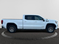 The All New GMC Sierra has been redefined from Hood to Hitch. This 4WD White Sierra is a Crew Cab Pi... (image 5)