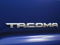 Introducing the sleek blue 2023 Toyota Tacoma. This truck is packed with various features to make yo... (image 4)