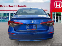 Experience effortless driving with this 2022 Honda Civic Sedan EX, boasting a sleek blue exterior an... (image 4)