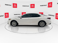 The 2024 Toyota Camry Hybrid LE is a popular and efficient mid-size sedan. It's the base trim level... (image 5)