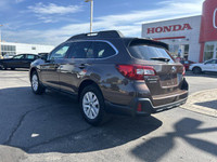 This 2019 Subaru Outback Touring SUV boasts a stunning Cinnamon Brown Pearl exterior and offers the... (image 6)