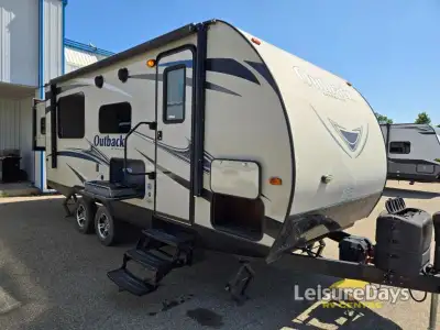 This Outback Ultra Lite 210URS travel trailer by Keystone RV is ideal for a family of four-six. With...