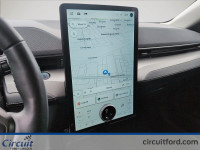 Traduire ceci en anglais: La Ford Mustang Mach-E 2021 avec batterie de 68 kWh se distingue par sa co... (image 9)