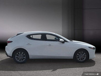 La Mazda3 Sport GS AWD 2025 affiche un design moderne et affirmé, reprenant la signature << Kodo >>... (image 7)