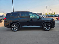 WAS: $53995 NOW: $53696 plus taxes and licensing feesThe 2023 Honda Pilot Touring is where spacious... (image 1)