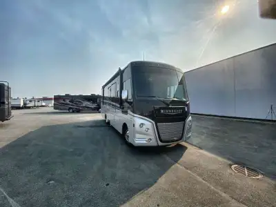 Winnebago Adventurer Class A gas motorhome 30T highlights: TrueComfort+ Sofa Dinette w/Chairs Pet Pa...