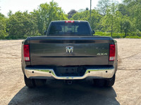 Tough, reliable, and built to handle anything you throw its way — this 2017 Ram 3500 SLT Dually with... (image 4)
