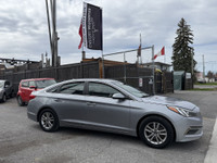 This 2016 Hyundai Sonata is a reliable sedan with a sleek gray exterior and a spacious interior in a... (image 3)