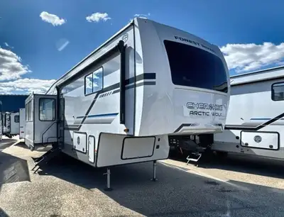 The Forest River Cherokee Arctic Wolf Suite 3250 is a luxury fifth wheel designed for comfort, style...