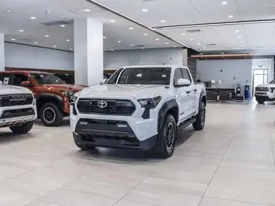 This Vehicle comes already equipped with a Block Heater, Hard Trifold Tonneau Cover, 4 Way Protectio...