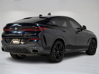 This 2020 BMW X6 M50i Coupe commands attention with aggressive styling, a powerful V8 engine, and re... (image 3)
