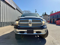 This 2014 Ram 1500 Laramie isnt just a truckits a fully loaded, diesel-powered workhorse with all th... (image 1)