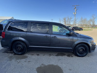 A get-it-done machine, our 2017 Dodge Grand Caravan Canada Value Package Minivan displayed in Granit... (image 5)