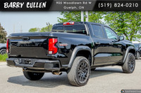 Get ready to conquer the road with the 2023 Chevrolet Colorado 4WD Trail Boss. This commanding black... (image 3)