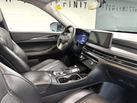 The 2023 Infiniti QX60 Luxe is equipped with a 3.5L premium engine producing 295 horsepower, paired... (image 6)