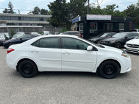 Come by and check out this dependable and budget-friendly 2015 Toyota Corolla CE! Powered by a fuel-... (image 6)